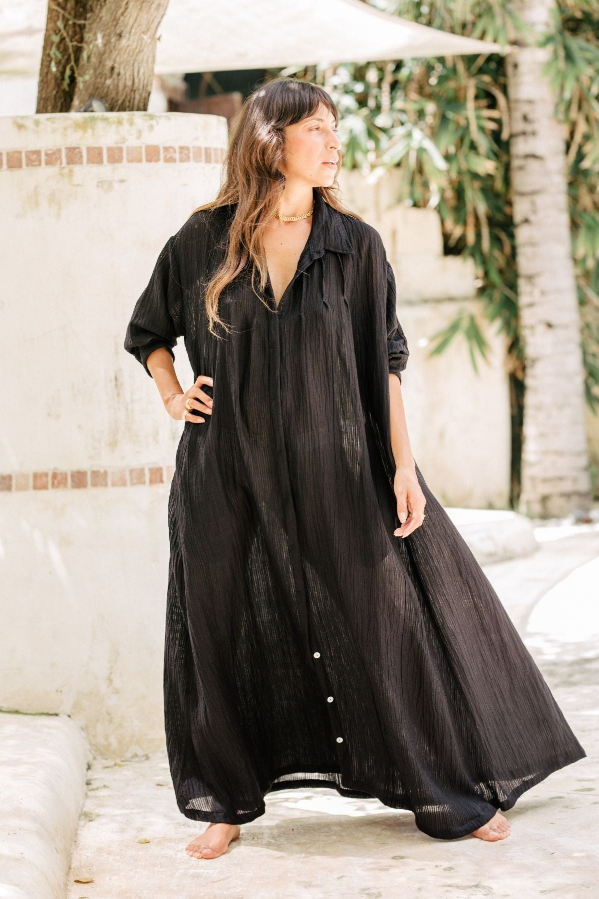Dark Moon Kundalini Gown in black linen luxe, handmade in Bali, worn for an eclipse rest ritual