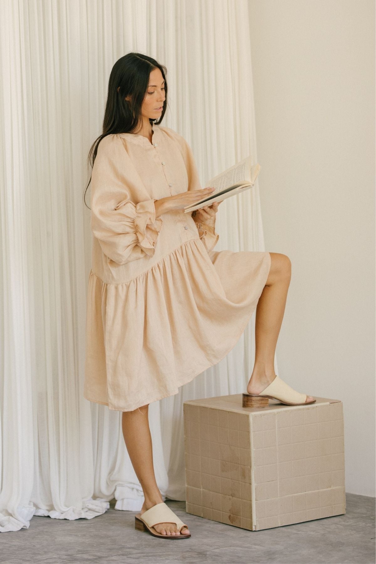 Back view of the Yema Dress Linen, Clay by Myrah Penaloza in linen, handcrafted in Bali by artisan families.