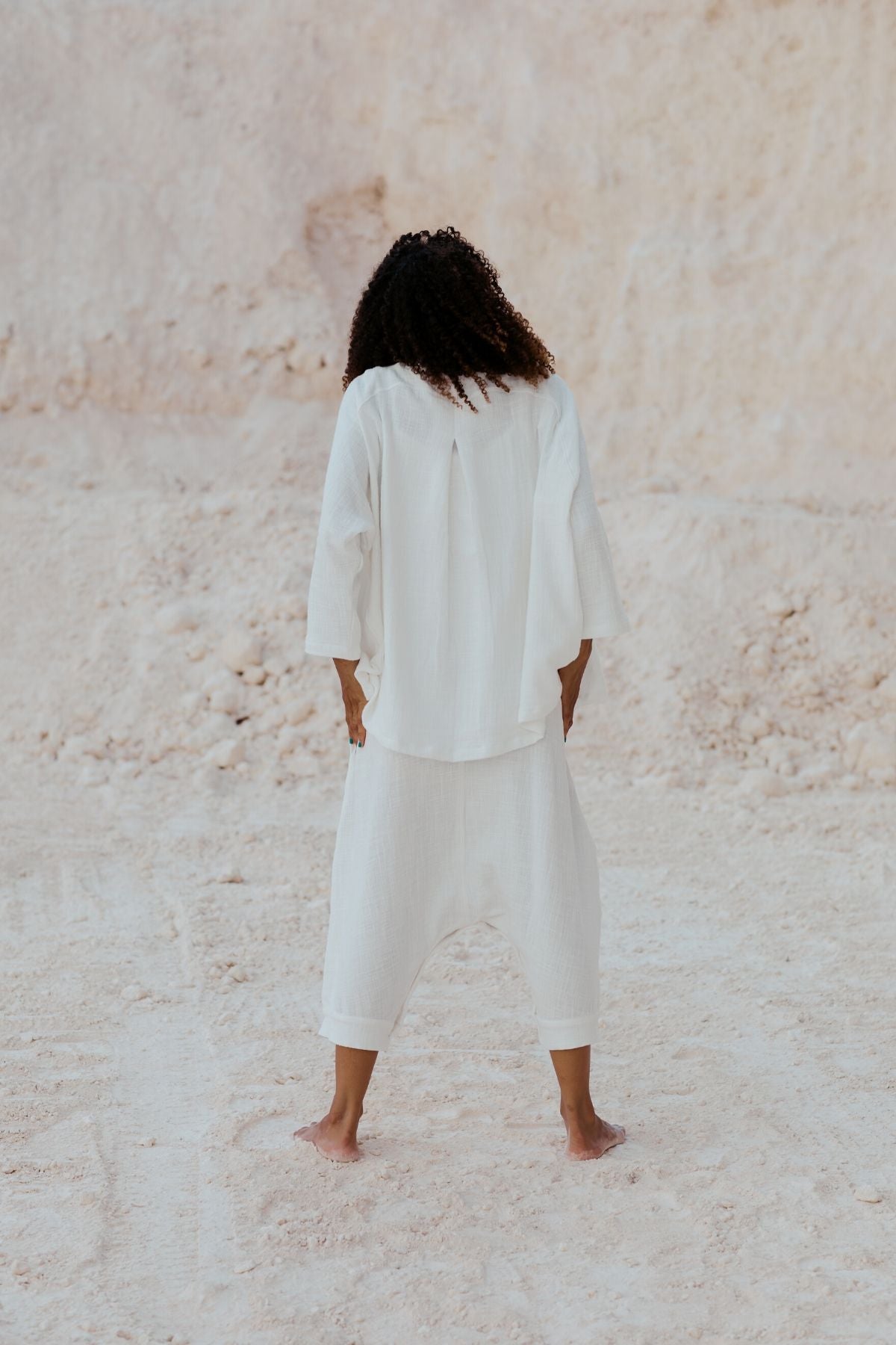 Full-length view of the White Golden Chain Jacket by Myrah Penaloza, handcrafted in Bali by artisan families.