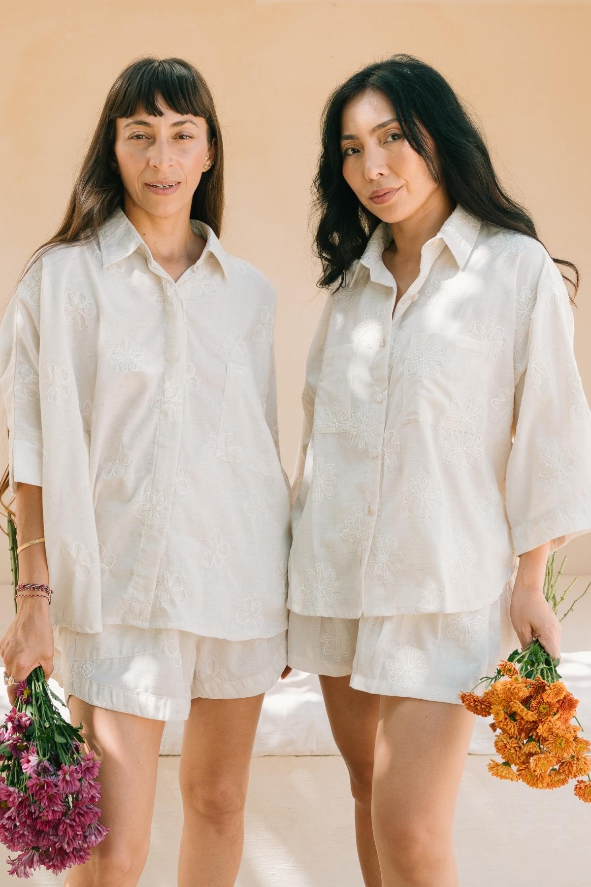 The Kamboja Suka Set in off white cotton with hand embroidered hibiscus, handmade in Bali