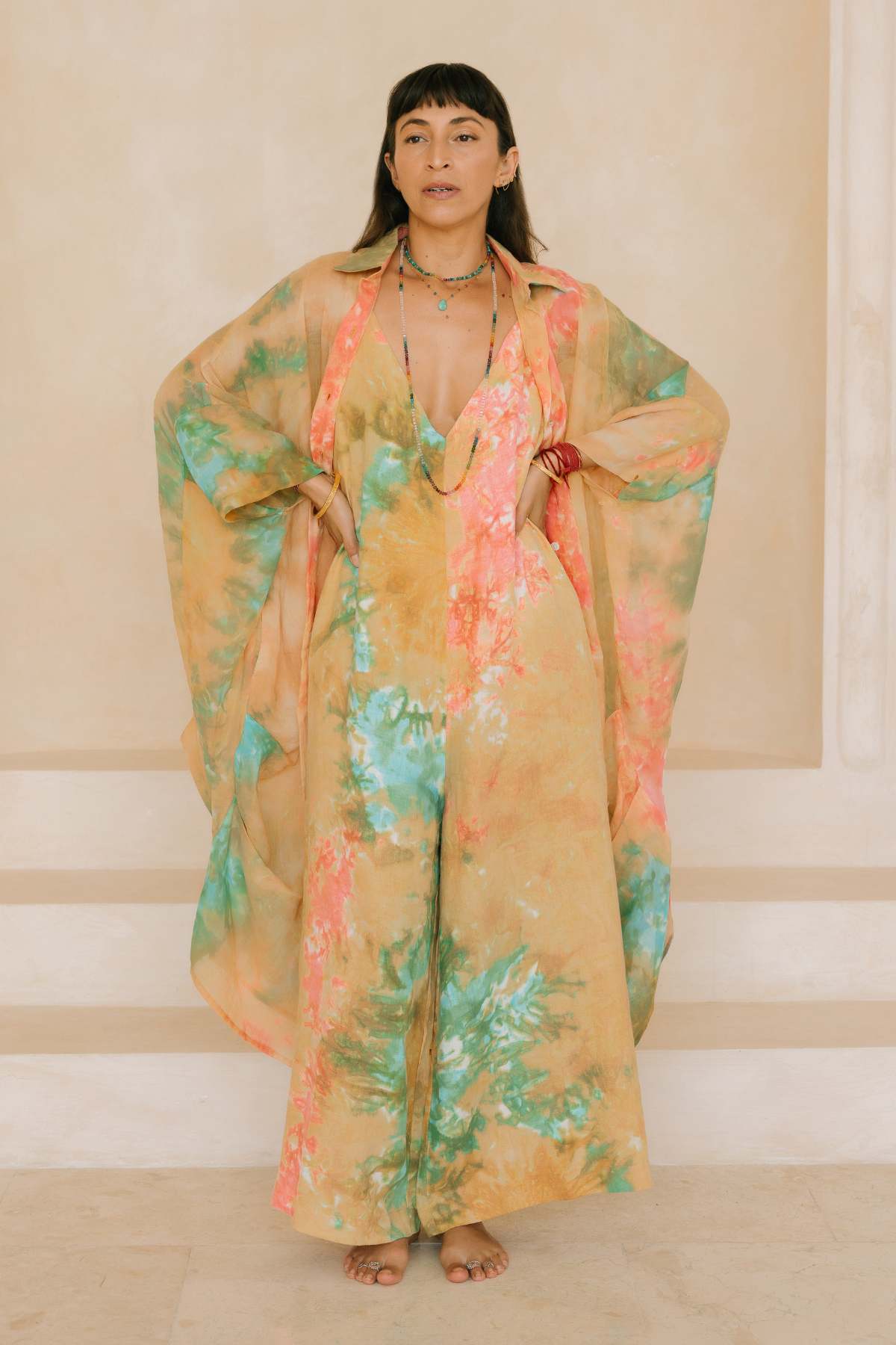 Ramie Origami Gown Kundalini Set Uluwatu Sunset by Myrah Penaloza. Hand-dyed ramie, architectural origami sleeve, ceremonial slow fashion.