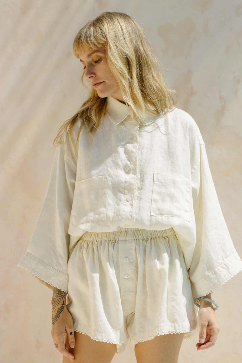 Nidra Button Down Set with Laces by Myrah Penaloza — 100% linen with lace sleeve detail, Moonlight colorway. Exaggerated sleeves, relaxed silhouette. Handcrafted in Bali.