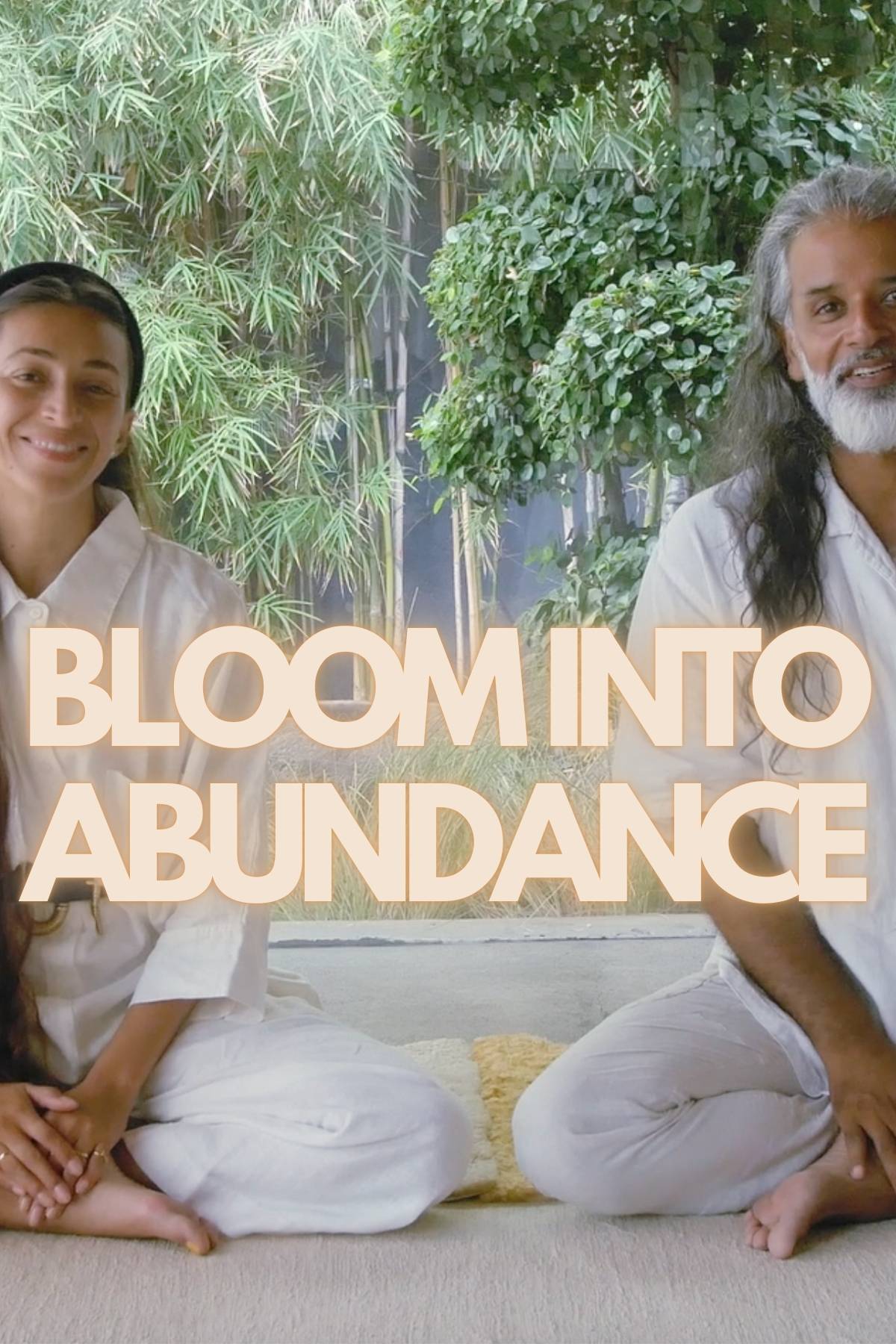 A man and a woman sit cross-legged on a mat surrounded by tall green plants, both dressed in white attire. The bold text "Portal To Bloom 1 Year Membership" graces the image, embodying the transformative power associated with Myrah Penaloza's Kundalini Yoga offerings.