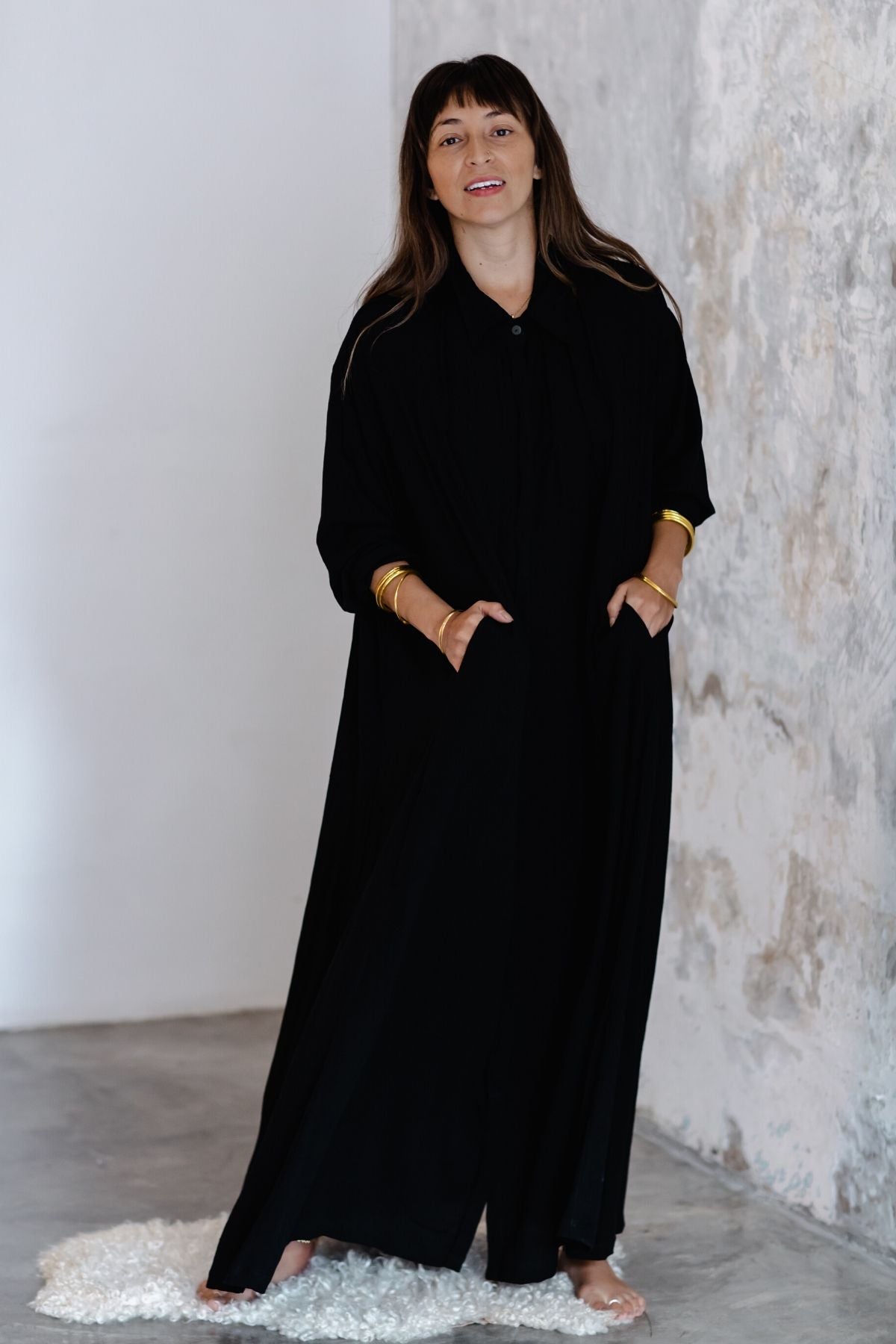 Natural light view of the Kundalini Gown by Myrah Penaloza, handcrafted in Bali by artisan families.