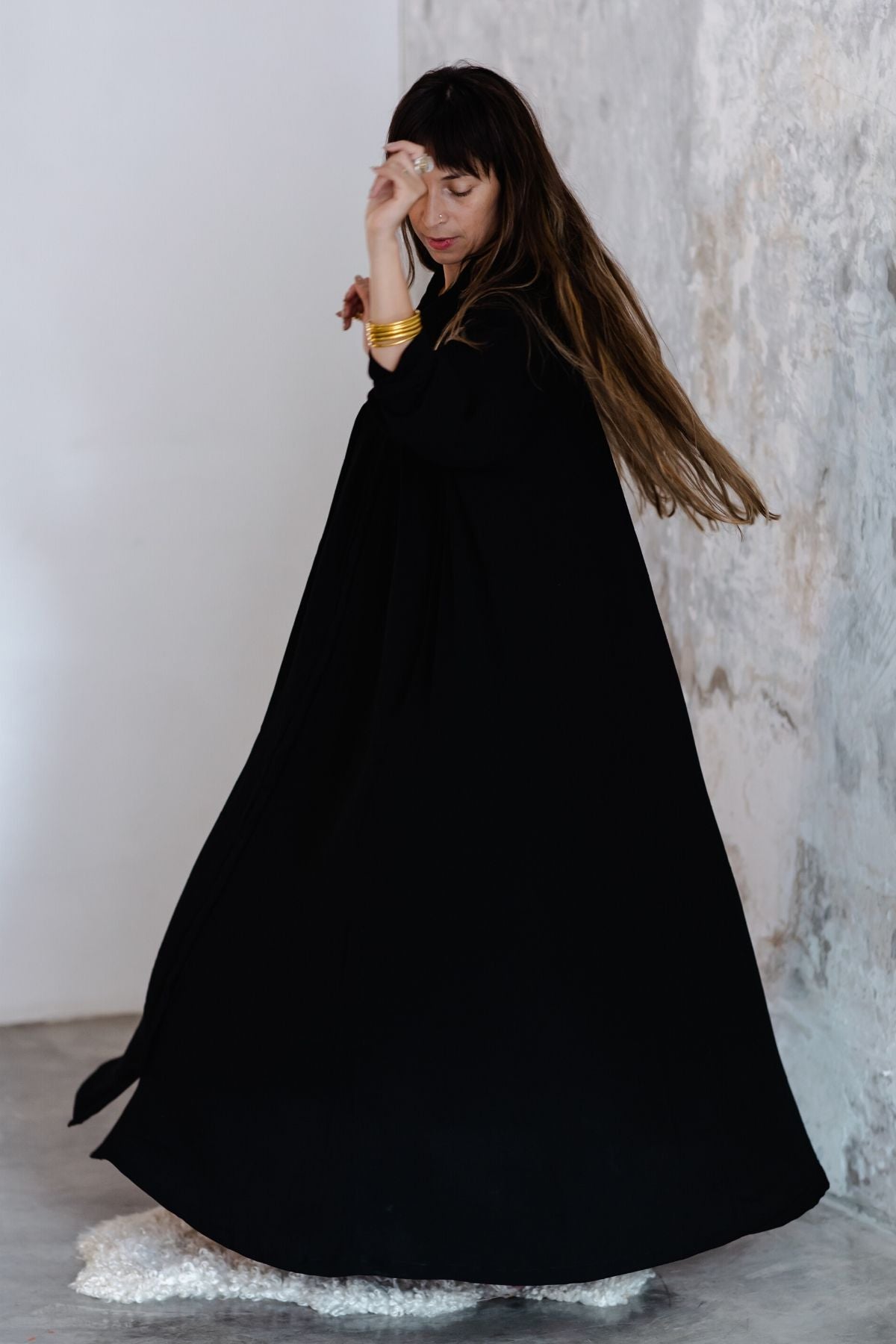 Styled view of the Kundalini Gown by Myrah Penaloza, handcrafted in Bali by artisan families.
