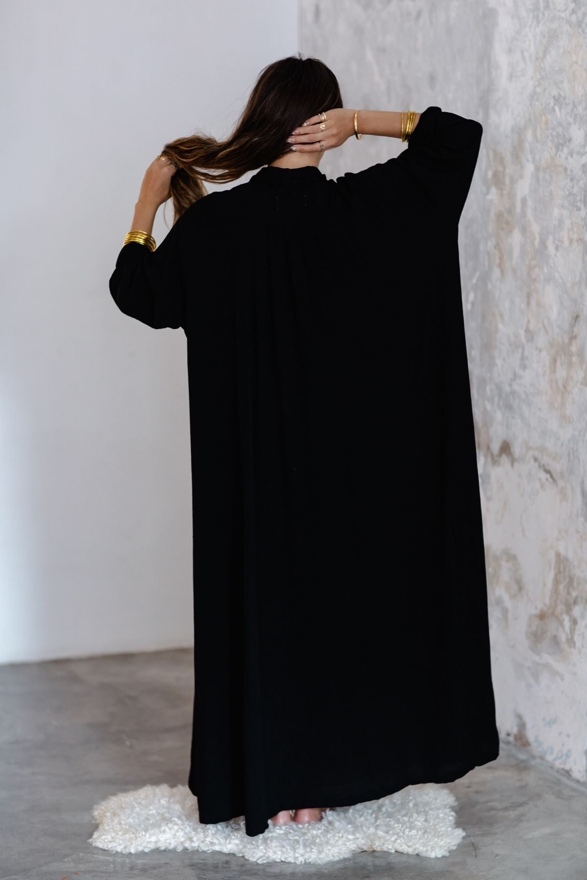 Detail of the hem of the Kundalini Gown by Myrah Penaloza, handcrafted in Bali by artisan families.