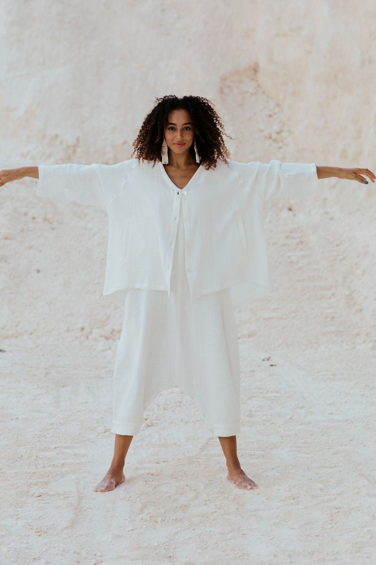 Styled view of the White Golden Chain Jacket by Myrah Penaloza, handcrafted in Bali by artisan families.