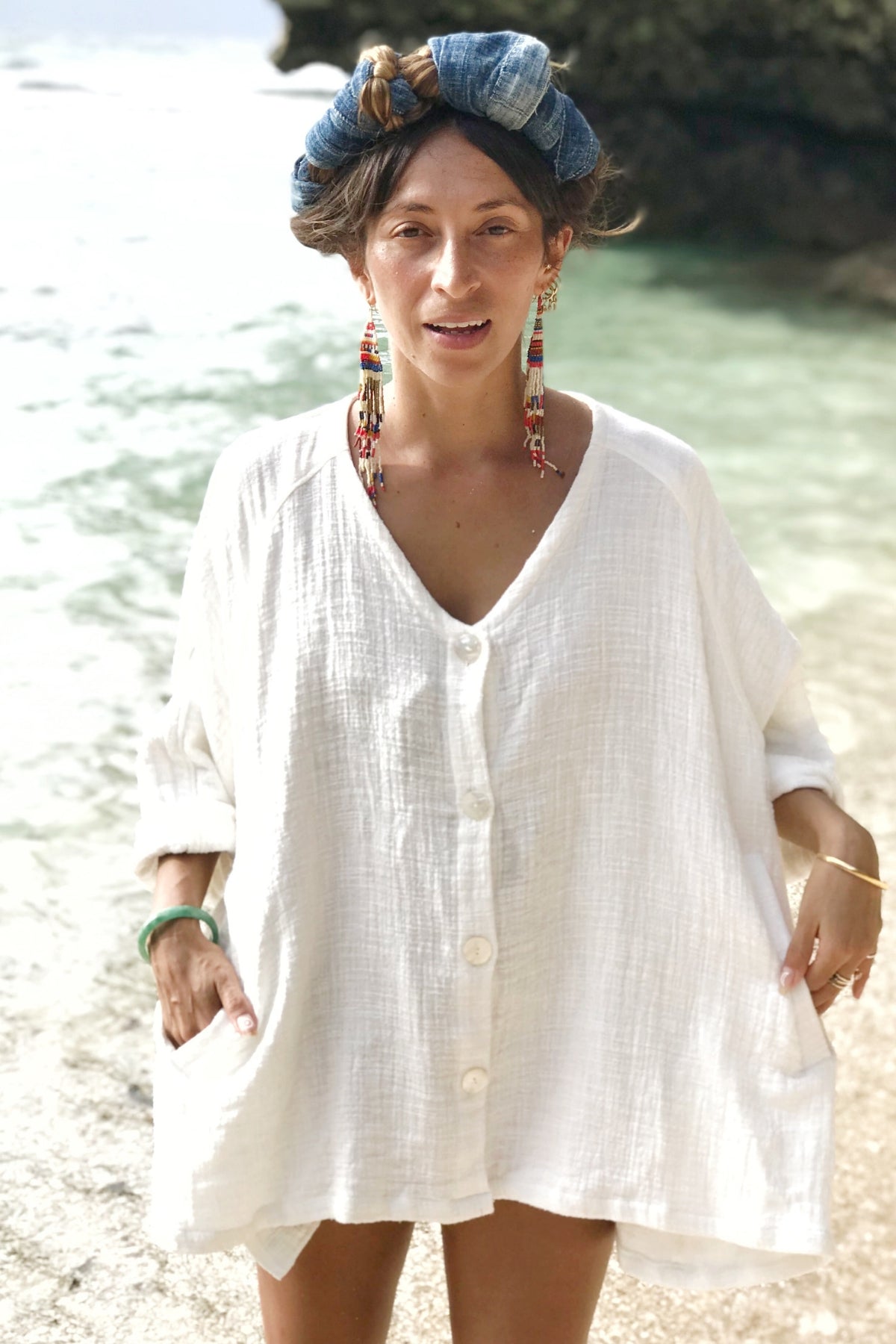 Detail of the neckline of the White Golden Chain Jacket by Myrah Penaloza, handcrafted in Bali by artisan families.