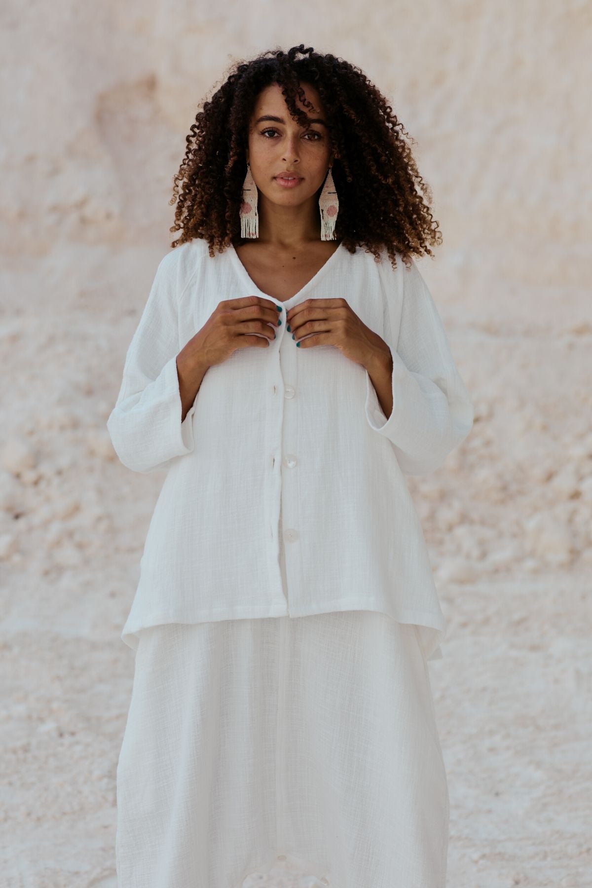 Back view of the White Golden Chain Jacket by Myrah Penaloza, handcrafted in Bali by artisan families.