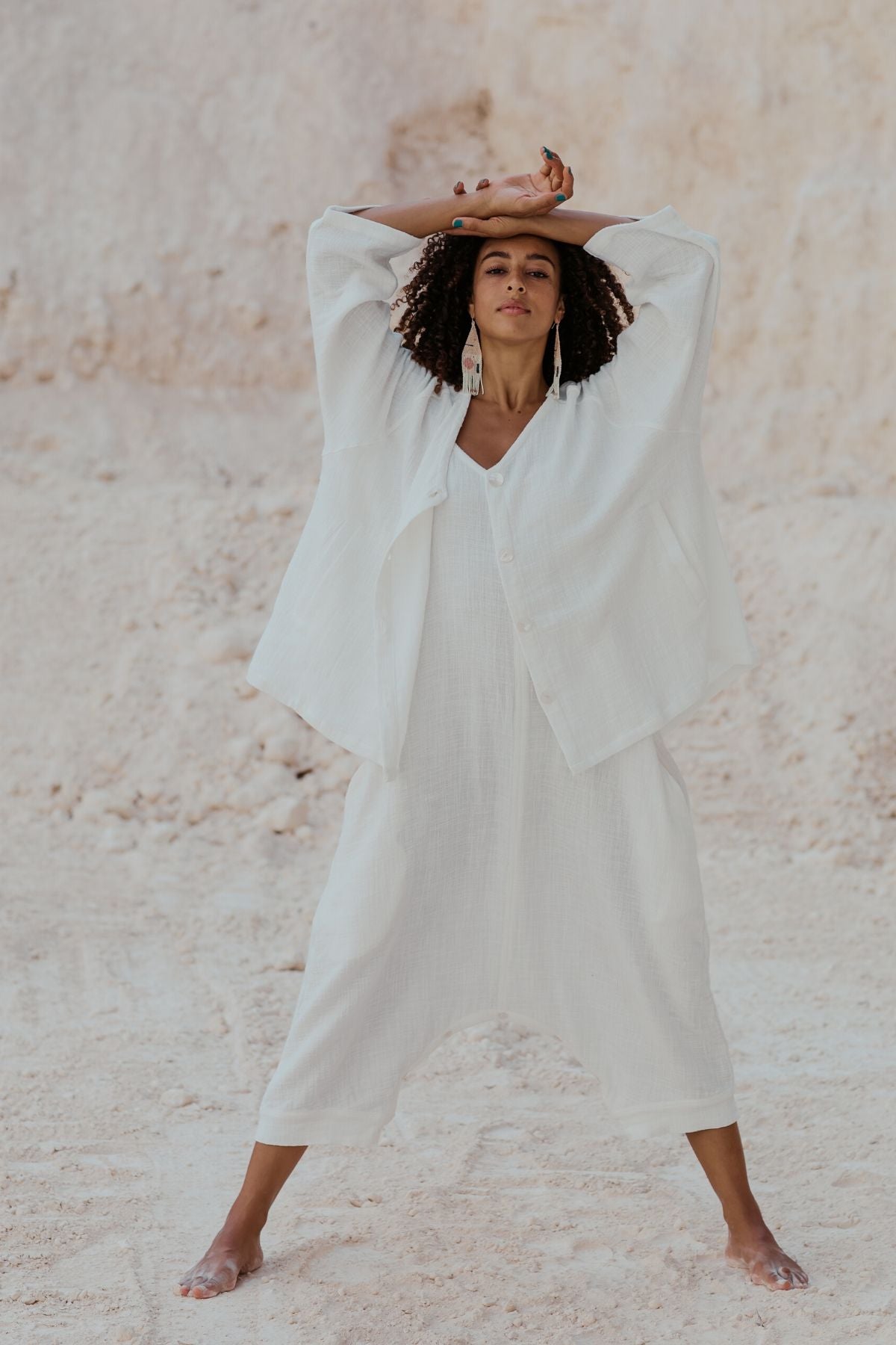 Side view of the White Golden Chain Jacket by Myrah Penaloza, handcrafted in Bali by artisan families.